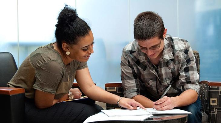 Student and counselor working on schedule